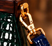 Bangkok Emerald Green. Hardware: Gold-tone rings, clasps and attachments.